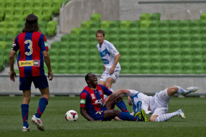 Emile Heskey screams in pain after a robust challenge from Nick Ansell. Photo: Zee Ko