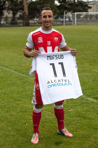 Melbourne Heart FC's Michael Mifsud with the Club's away jersey and new back of shirt sponsor, ALCATEL onetouch (25-10-13)