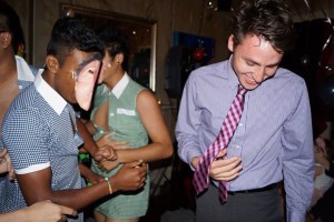 Melbourne Victory’s reported new signing [middle] seen wheeling away from the press. Again, no TCF staff in sight.