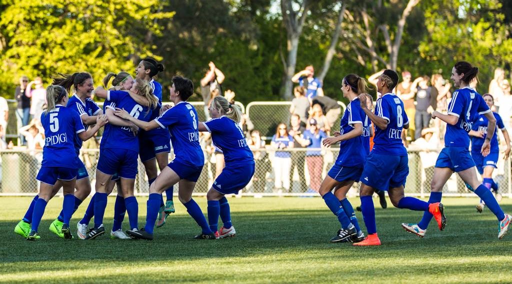 South Melbourne celebrate Grand Final victory. Photo: Graeme Furlong 